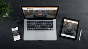 Laptop, tablet, and smartphone displaying a digital marketing website for local businesses, emphasizing responsive design and online presence.