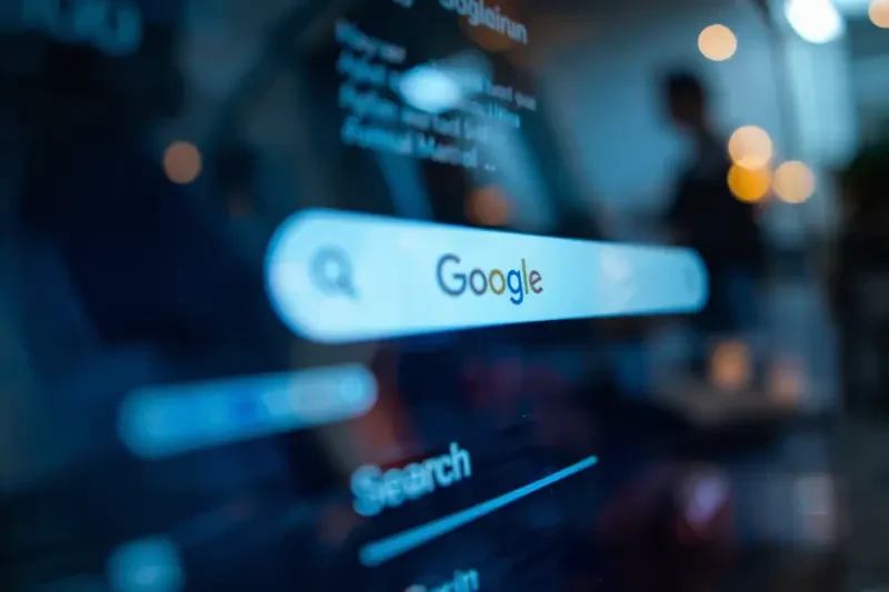 Google search interface displayed on a screen, emphasizing digital marketing and local SEO strategies for service-based businesses.